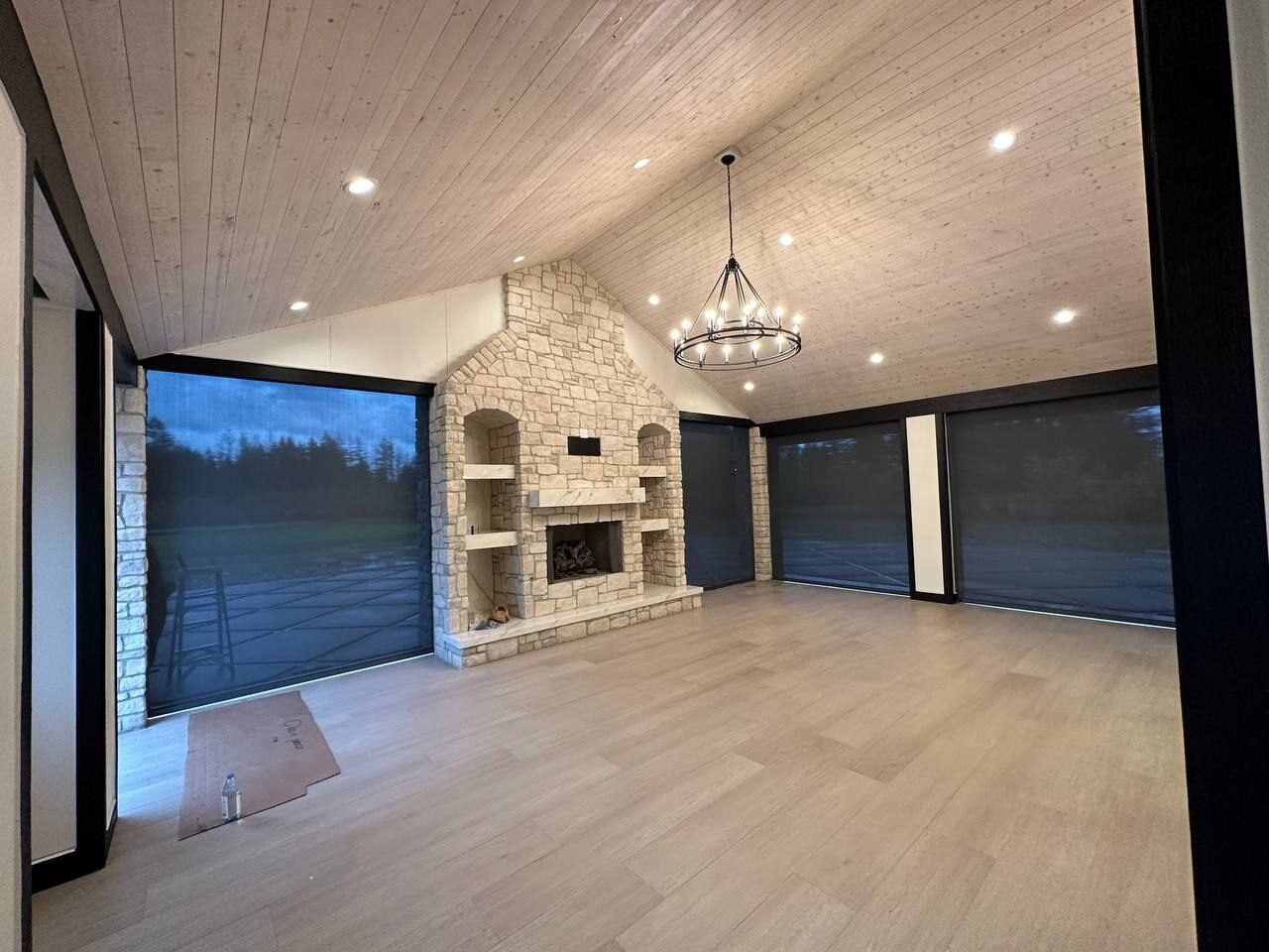 Great room with vaulted wood ceiling, ring chandelier and recessed lighting, Vancouver WA