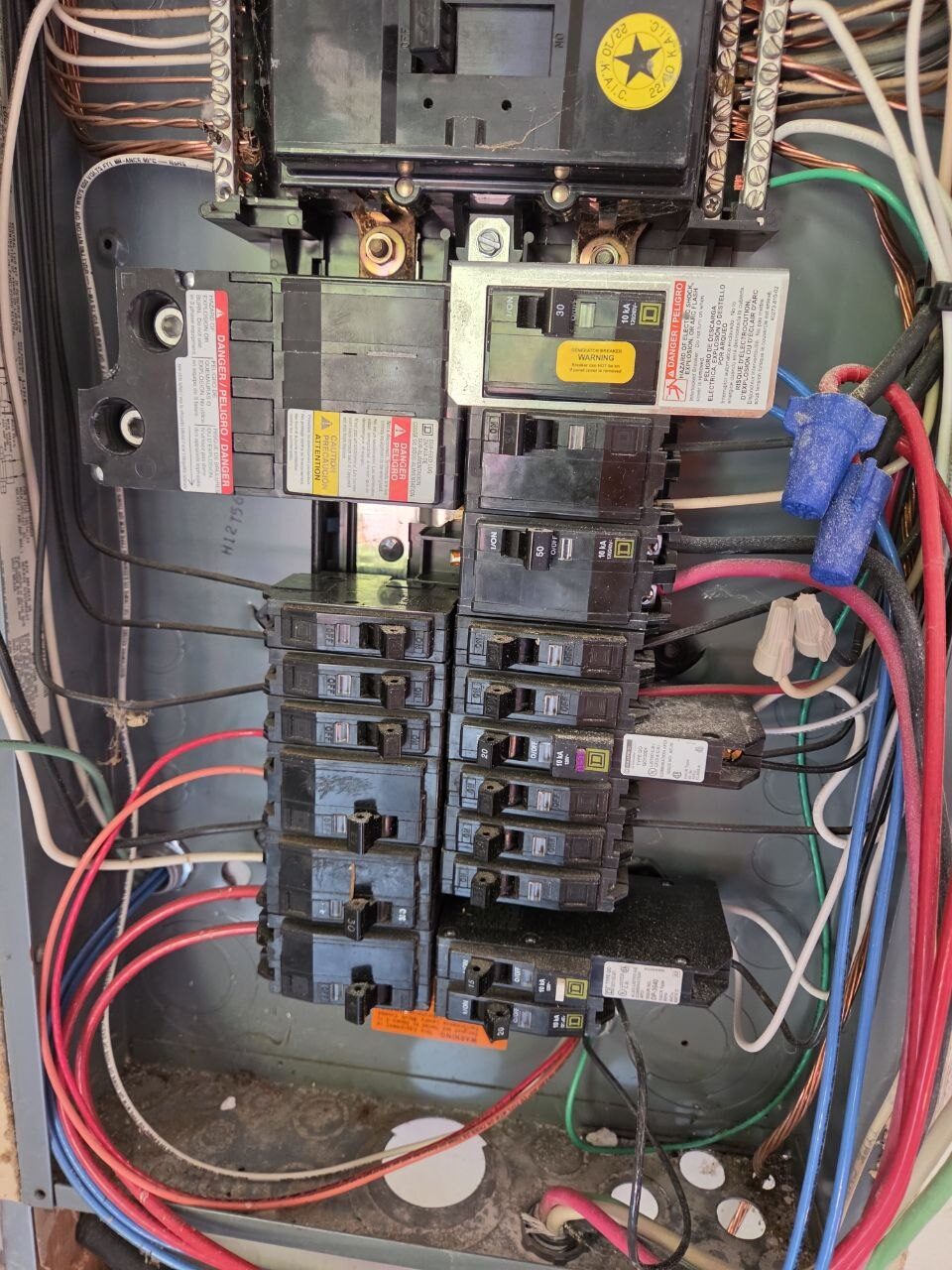 Original overloaded electrical panel with no spare breaker space in a Vancouver WA home